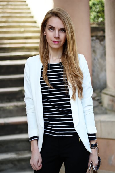 Black striped long sleeve top with white bomber jacket