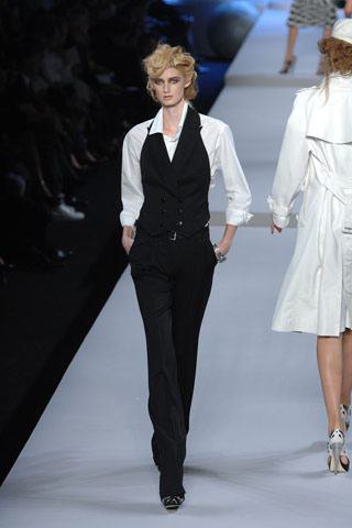 Black suit waistcoat with white shirt and suit pants