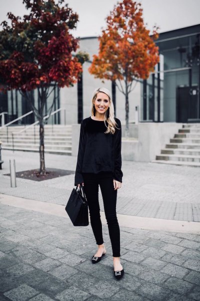 Black sweater with skinny jeans and flat ballerinas