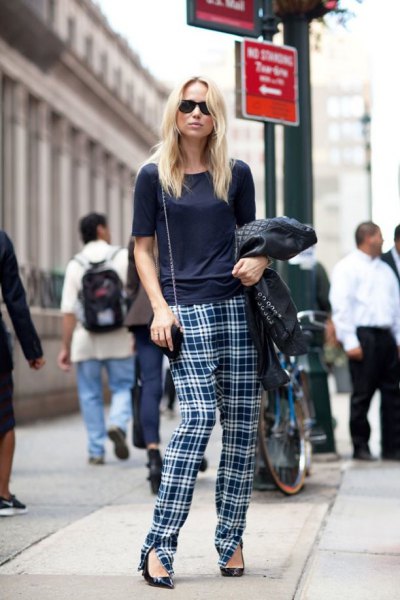 Black t-shirt with checked pants and pointed heels