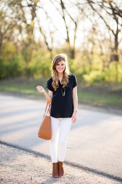 Black t-shirt with white skinny jeans and camel open toe ankle boots