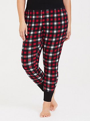 Black tank top with red and white checked pajama bottoms with
tapered legs