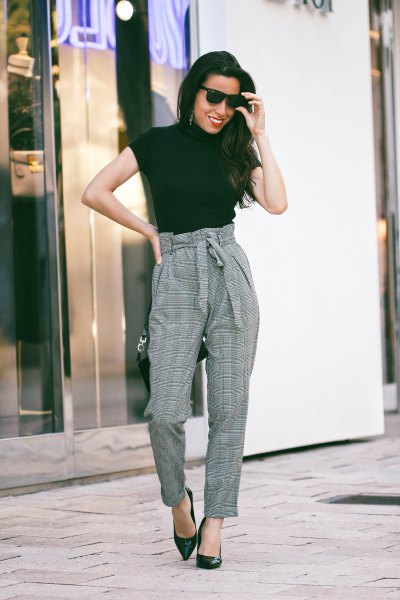 Black t-shirt with slim fit checked pants that tie at the waist