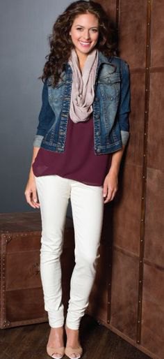 Black tunic shirt with blue denim jacket and cream slim fit jeans