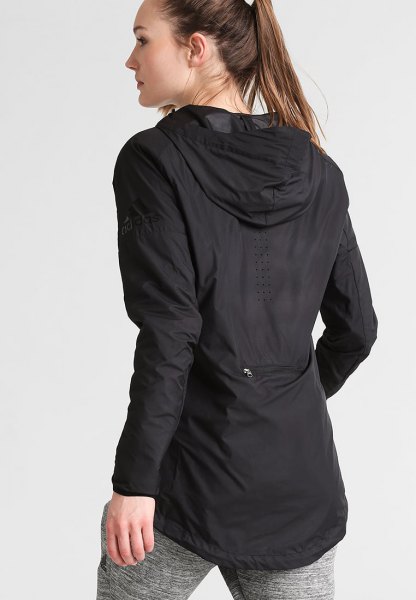 Black tunic windbreaker with mottled gray cotton running tights