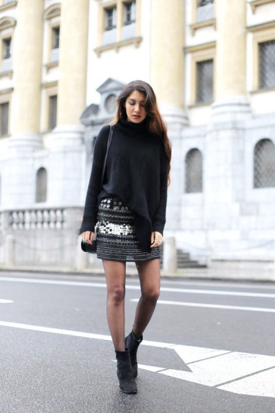 Black turtleneck sweater with a patterned knitted mini skirt
