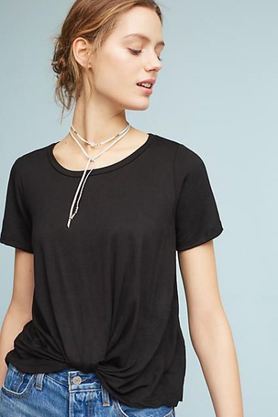 Black twisted t-shirt with blue jeans