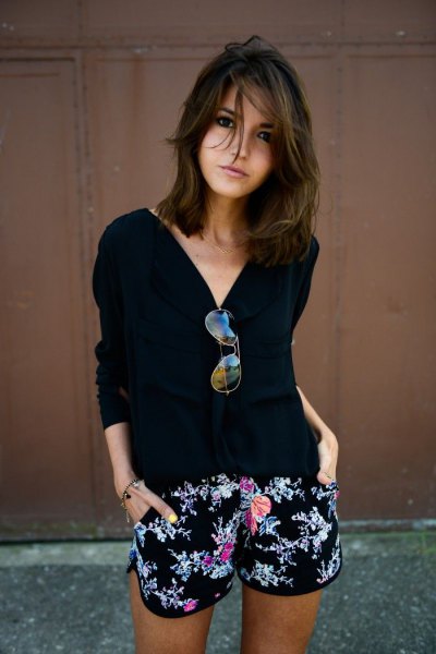 Black V-neck sweater and mini cotton shorts with tribal print
