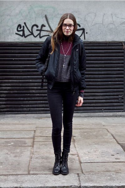 Black windbreaker with gray turtleneck and skinny jeans