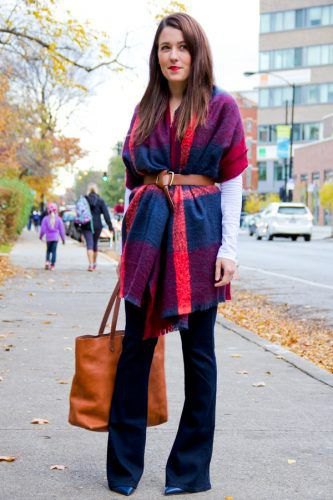 Blue and orange belted pashmina blanket scarf, black blouse and flared jeans