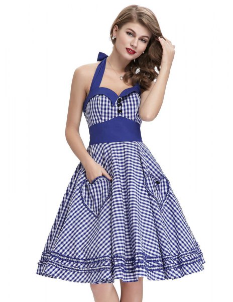 Blue and white halterneck dress with a flared silhouette and sweetheart neckline