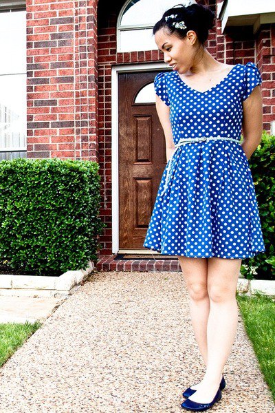 Blue and white polka dot mini skater dress with a belt and navy blue ballet flats