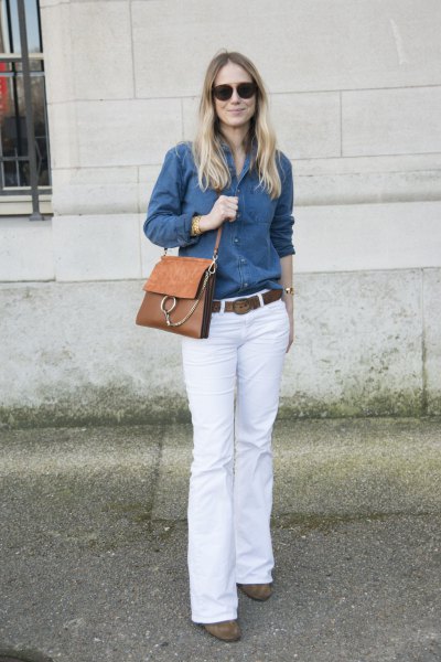 Blue button down chambray shirt and white flared jeans