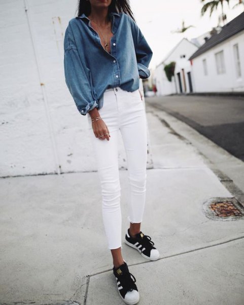blue chambray shirt with white skinny jeans