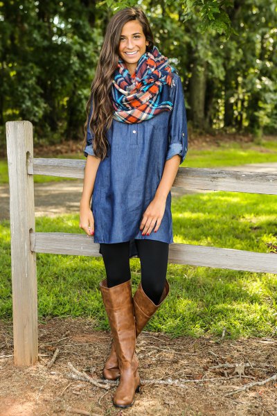 blue coated chambray shirt with brown over the knee leather boots