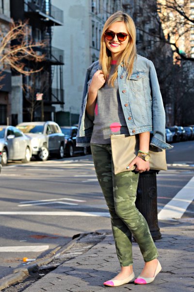 blue denim jacket with a gray crew-neck sweater and pink ballerinas