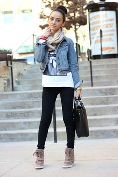 Blue fitted denim jacket with white printed t-shirt and gray wedge sneakers
