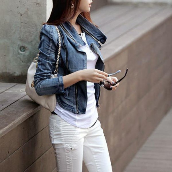 blue denim jacket with puff sleeves and white moto jeans