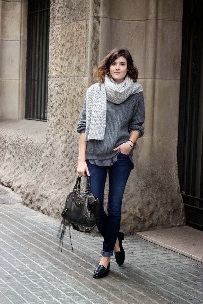 Blue ribbed chunky sweater with black casual loafers