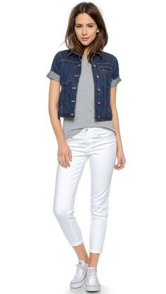 Blue short sleeve cuffed denim jacket and white cropped jeans