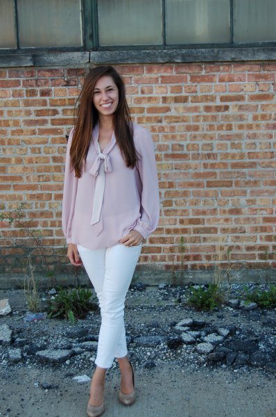 soft pink chiffon blouse with white ankle jeans