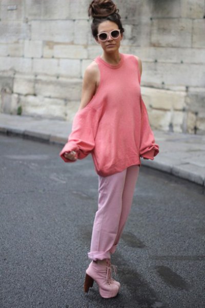 Blushing off the shoulder pink sweater with white cuffed jeans and
platform heels