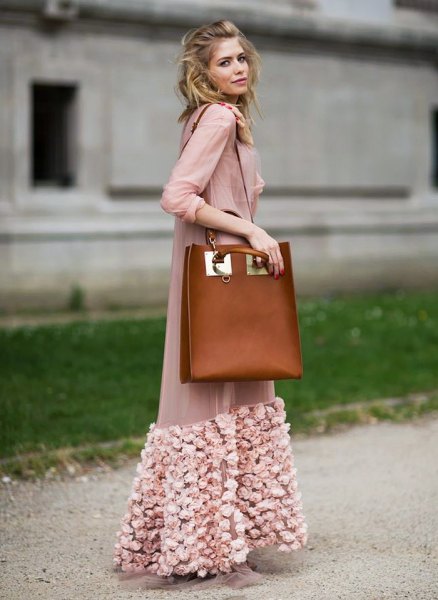 Soft pink maxi chiffon jacket with floral embroidery and brown leather shoulder bag