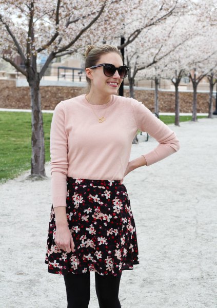 blush pink sweater with black and white floral mini skirt