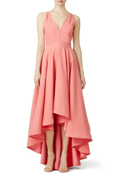 Blush pink maxi cocktail dress with a V-neckline and a high, plunging hemline