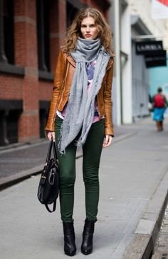 brown leather jacket with gray turtleneck top and matching scarf