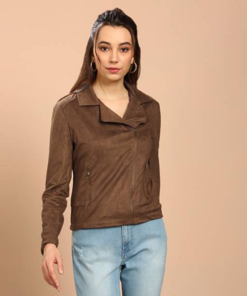 brown nylon sports jacket with light blue jeans