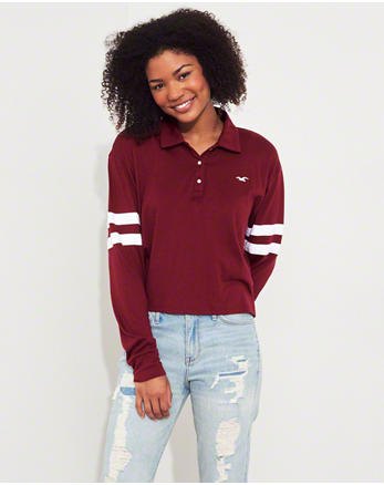 Burgundy relaxed fit polo shirt and light blue boyfriend jeans