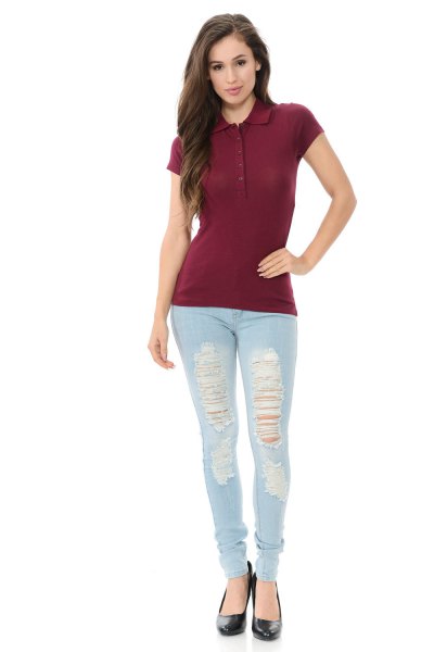 Burgundy slim fit polo shirt paired with light blue ripped skinny jeans