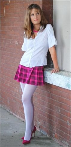Shirt with buttons, pink plaid skirt and white leggings