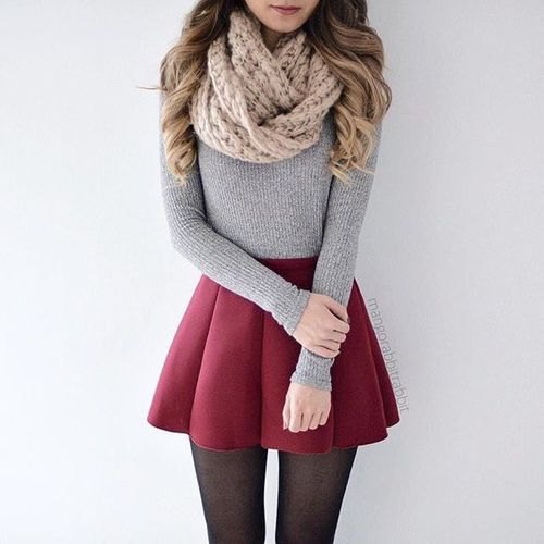 Cable knit scarf, fitted gray sweater and maroon pleated mini skirt