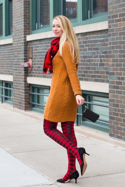 Cable knit sweater dress and red and black check leggings