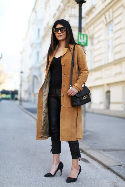 Camel colored midi suede coat with all black outfit