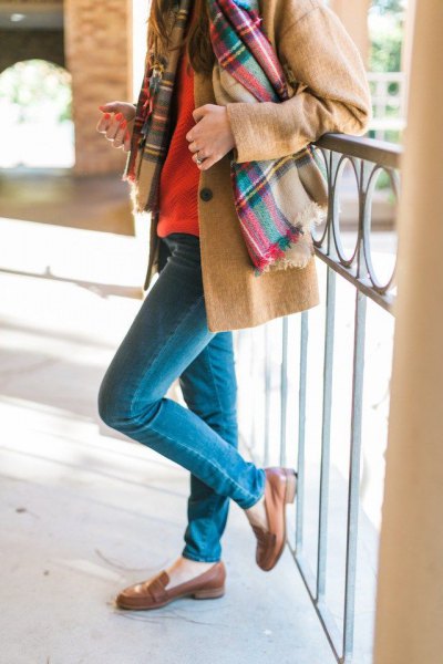 Camel wool coat with a plaid scarf and brown slippers