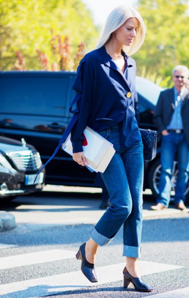 Chiffon blouse with cuffed jeans and navy blue platform heels