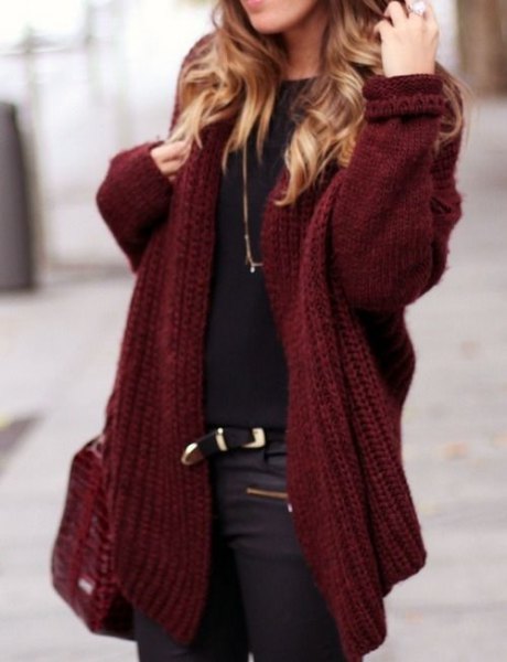 Chunky maroon sweater cardigan with black t-shirt and leather motorcycle pants