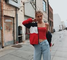 Color block windbreaker with red cropped cami top with spaghetti straps