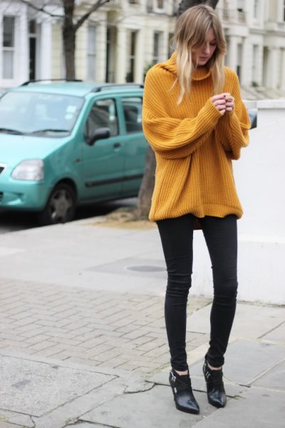 Coarse rib cowl neck sweater paired with black skinny jeans