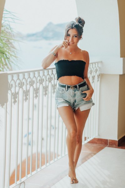 Cropped black skinny top with belted mini denim shorts