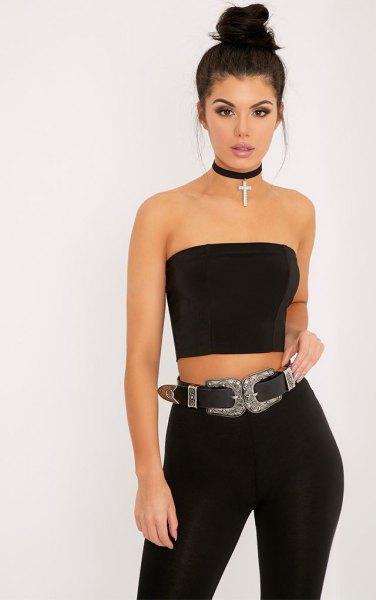 Cropped black drainpipe top with choker and skinny jeans with belt