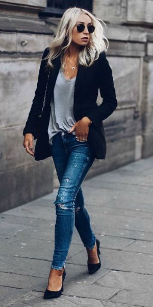 dark blue blazer with gray v-neck t-shirt and ripped jeans