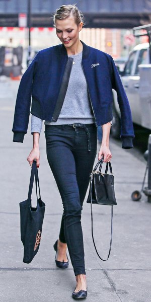 dark blue jacket with gray sweatshirt and high waisted jeans