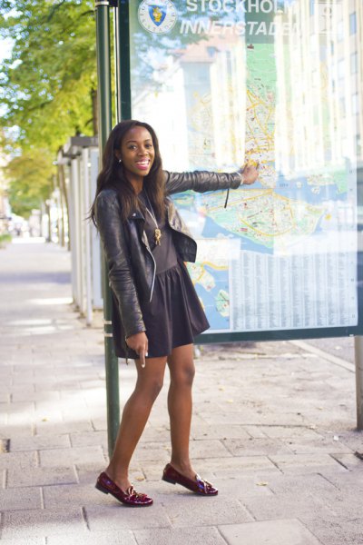 dark gray leather jacket with skater skirt and burgundy
loafers