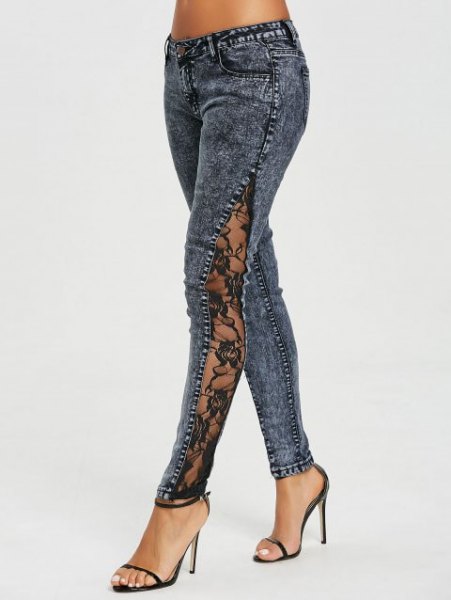 Dark gray lace jeans with a side slit and black heels with an open
toe