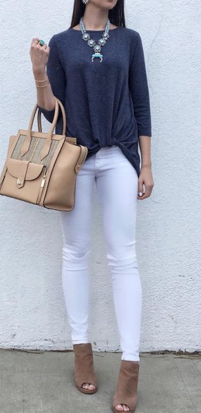 Dark gray top with three quarter sleeves, white jeans and open toe boots