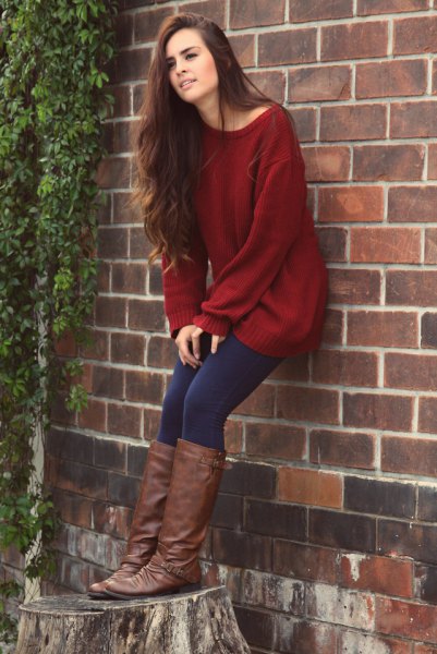 Dark red tunic sweater with a boat neckline, dark blue leggings and
knee-high boots
